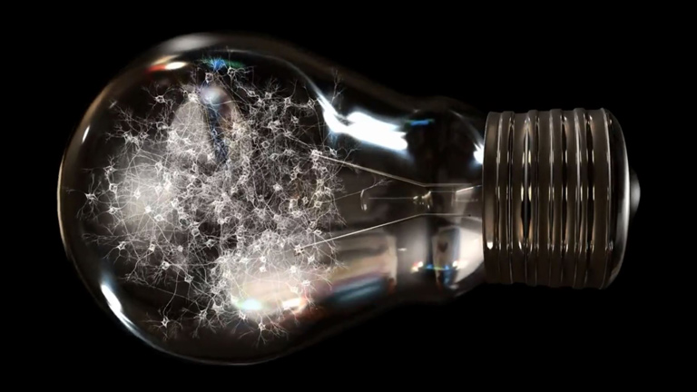 Light bulb on black background